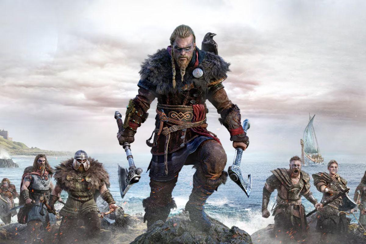 A fierce Viking warrior stands on a rocky shore, holding axes, with a group of Viking allies and a longship in the background under a cloudy sky.
