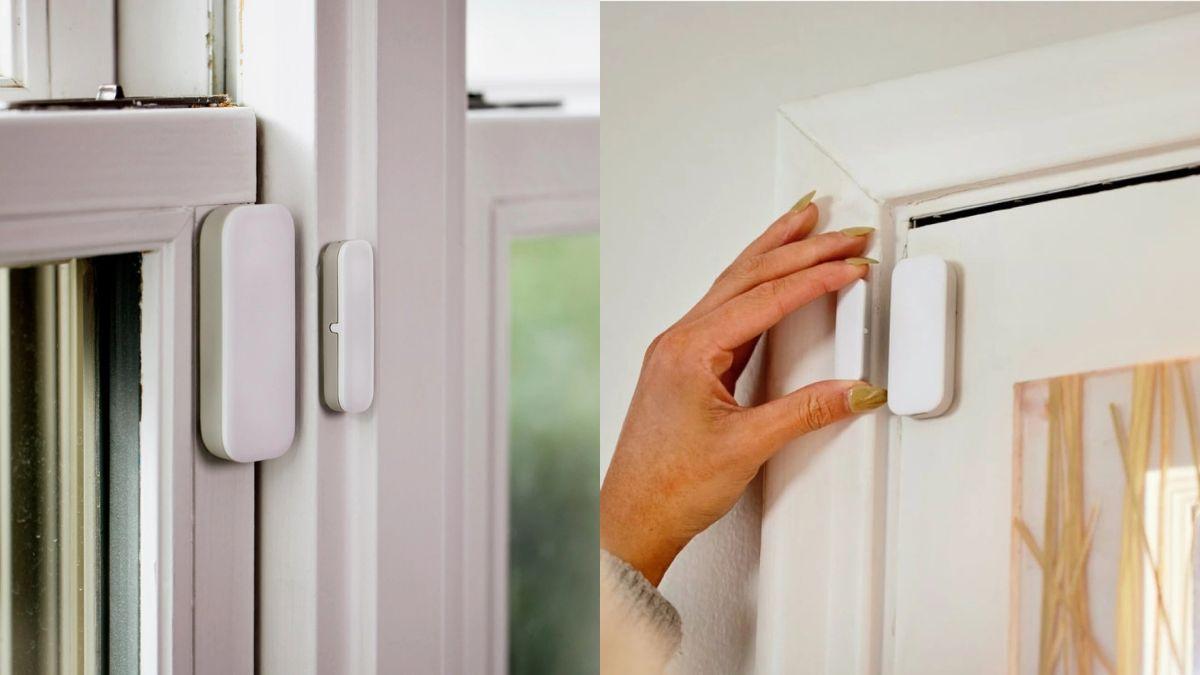 A close-up of door and window sensors installed on frames for home security.