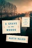 A Grave in the Woods: A Bruno, Chief of Police Novel (Bruno, Chief of Police Series Book 17)