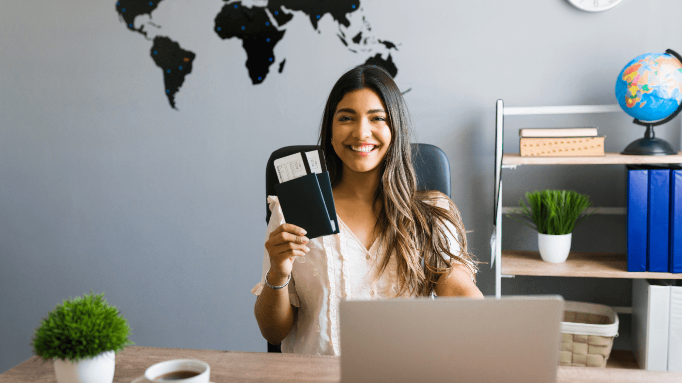 Excited young woman is holding a passport with flight tickets, celebrating a cheap flight deal.