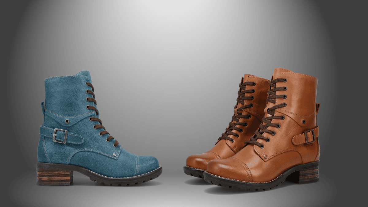 A pair of rugged lace-up boots in teal suede on the left and brown leather on the right, both featuring side buckles, low wooden heels, and sturdy, treaded soles for a fashionable yet functional look.