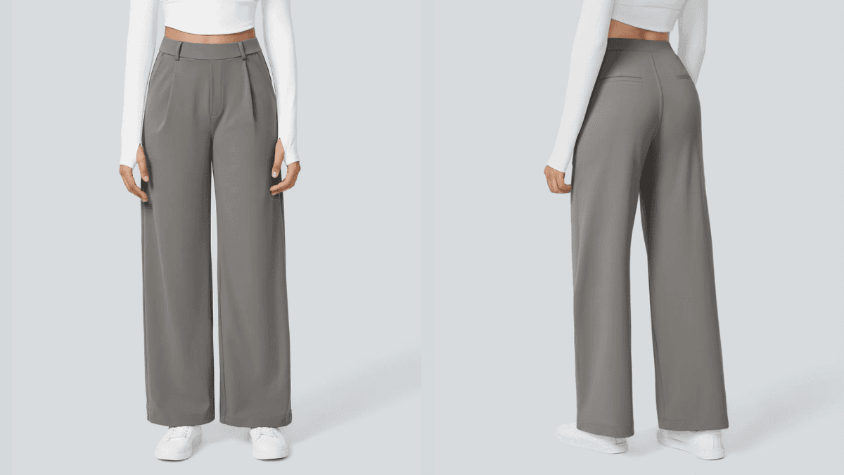 A model wearing high-waisted, wide-leg gray trousers with a tailored fit, shown from the front and back, paired with a white long-sleeve crop top and white sneakers, against a light gray background.