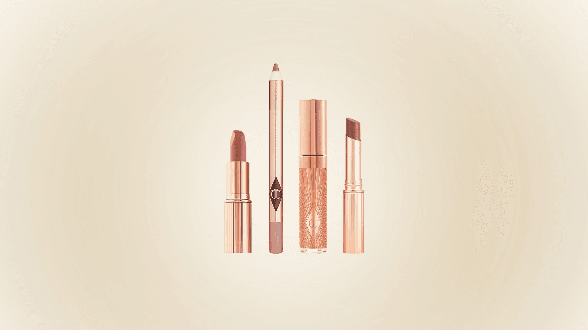 Elegant makeup set featuring a lipstick, lip liner, lip gloss, and tinted balm in rose-gold packaging, displayed against a soft beige gradient background.