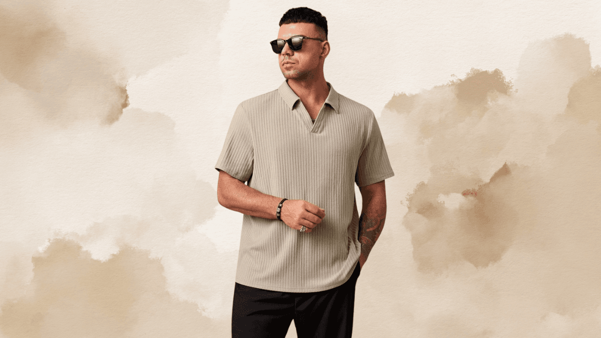 A man wearing a beige ribbed short-sleeve polo shirt, black pants, and sunglasses, standing against a beige textured background.