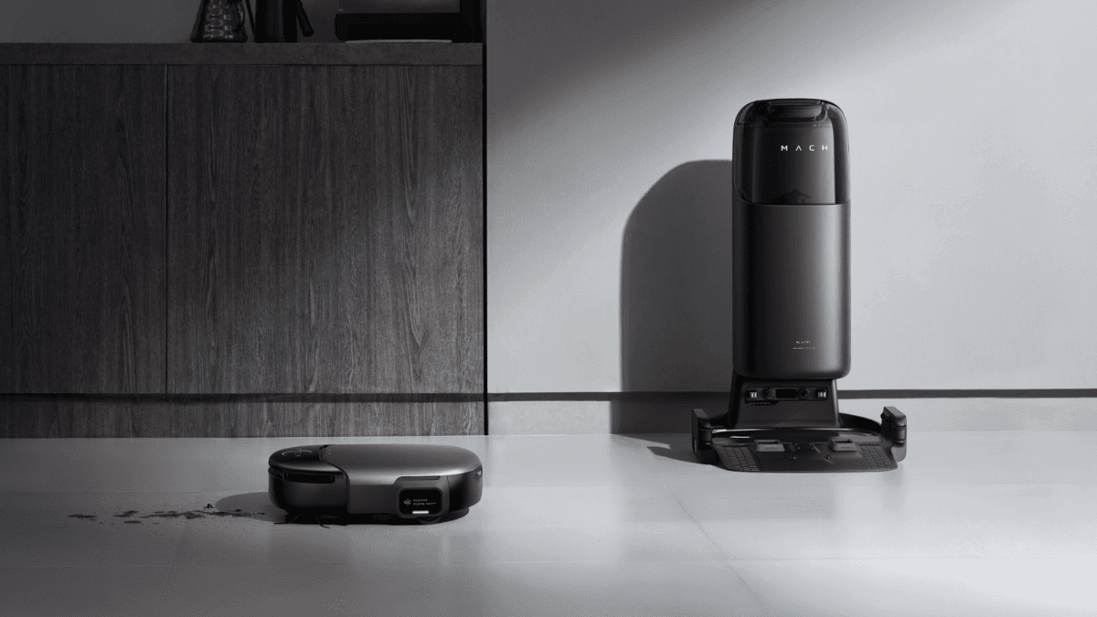 Smart robot vacuum cleaning a tiled floor with its docking station nearby.